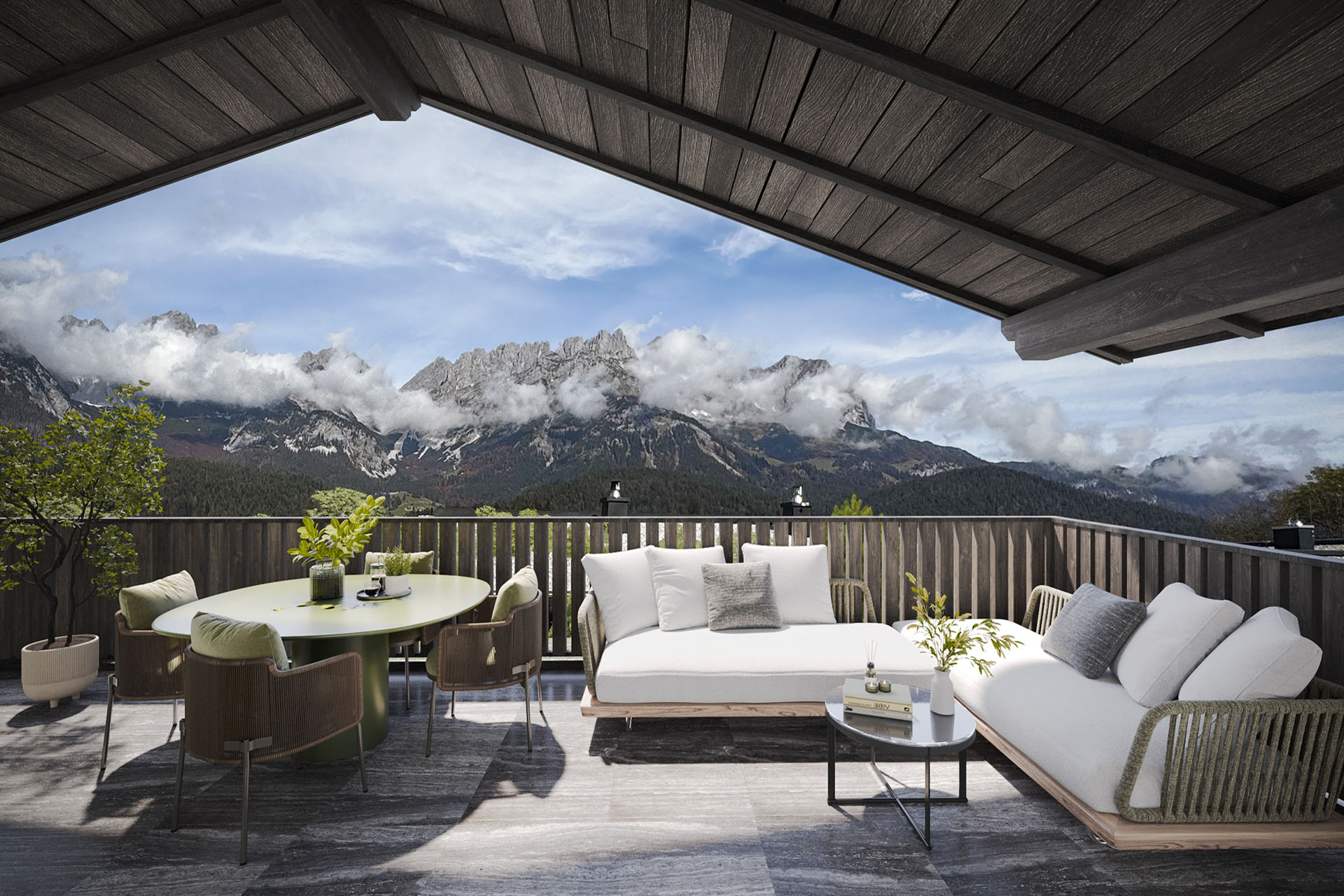 Luxuriöse Terrasse mit Bergblick, moderner Outdoor-Lounge und Essbereich, umgeben von Natur und Wolken.
